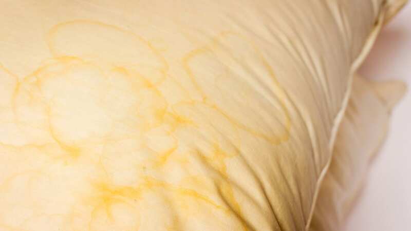 Yellow pillow stains are unsightly - but they are surprisingly easy to remove (stock photo) (Image: Getty Images/iStockphoto)