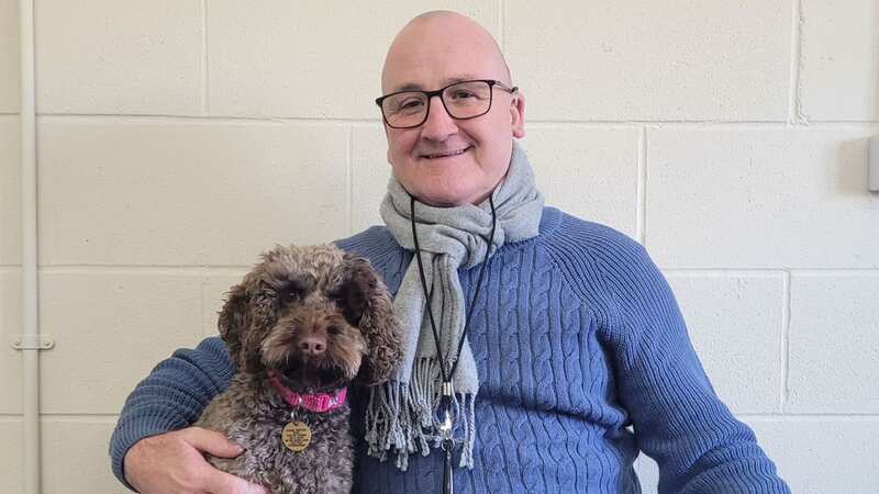 Viv the dog with Stephen (Image: Caters News Agency)