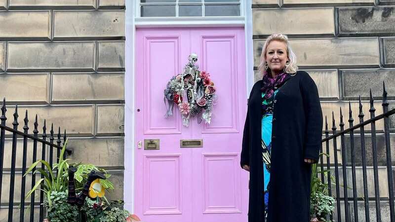 Miranda pictured by her front door painted "off-white" (Image: Miranda Dickson)