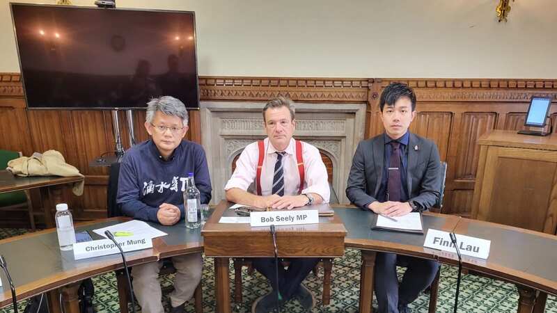 Finn Lau and Christopher Mung with Bob Seely at last week