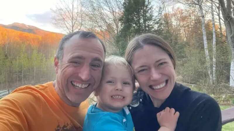 Tate Holtzman, pictured with his parents, died after drowning in a water storage tank (Image: GoFundMe, Kali Brgant/Newsflash)