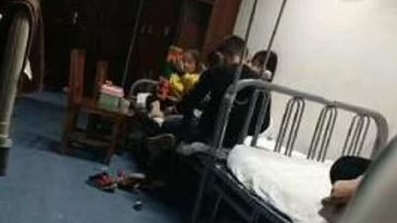 The young victims of the poisoning being tended to by hospital staff (Image: Toutiao News)