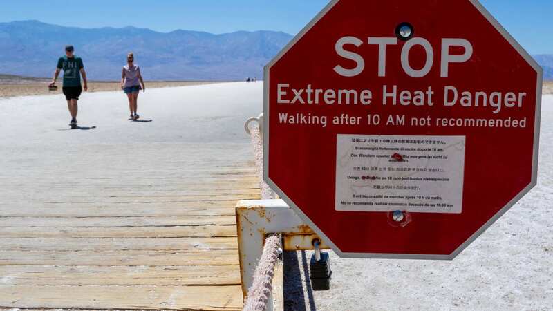 Tourists are undeterred by the scorching heat and continue to visit the park, which boasts being the lowest, hottest, and driest place on Earth (Image: AP)