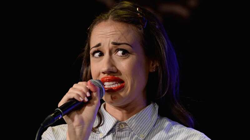 Comedian Colleen Ballinger performing on stage as her famous YouTube character Miranda Sings