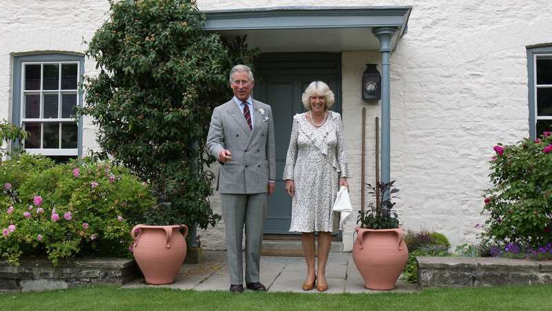 The King and Queen Camilla outside the cottage in 2009 (Image: Getty Images)