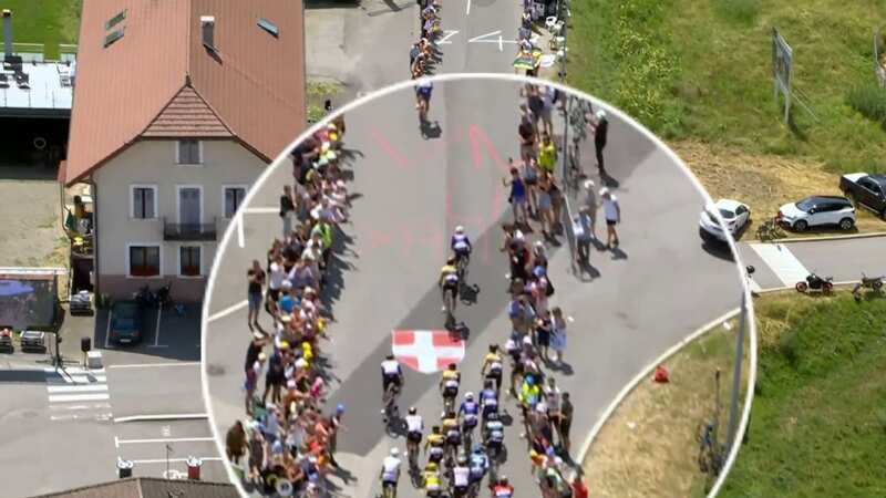 Sepp Kuss was floored by a spectator taking a photo (Image: ITV)