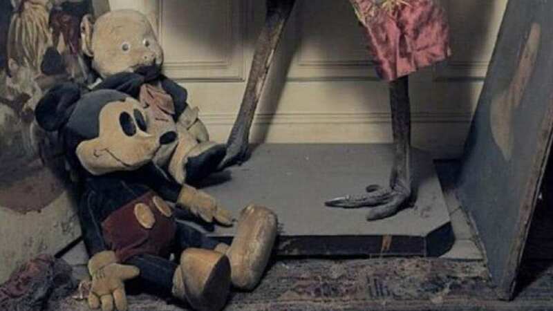 The Paris apartment contains abandoned furniture and toys - now forgotten and covered in dust (Image: AFP/GETTY)