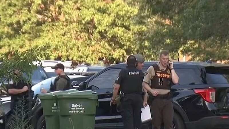 Law enforcement officials at the scene (Image: KOTV-DT)