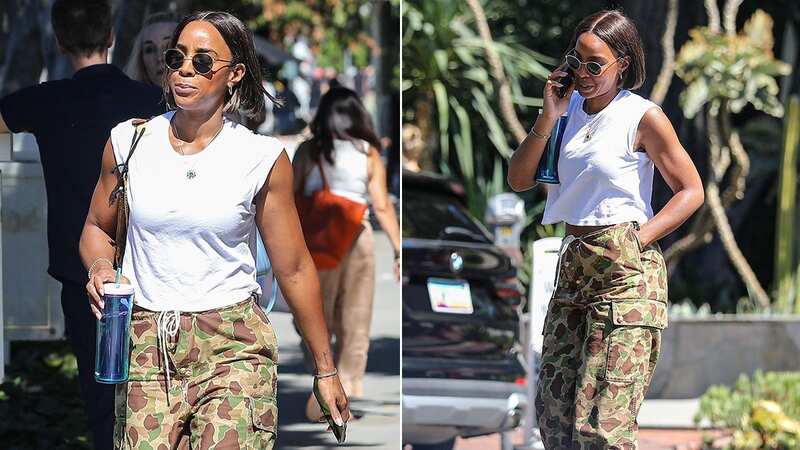 Kelly Rowland shows off ripped arms in tank top and pants for leisurely stroll