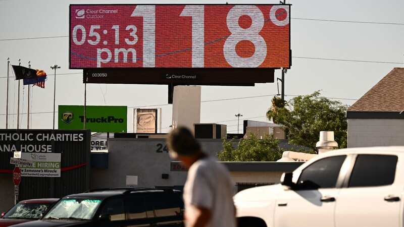 A billboard displays a temperature of 118 degrees Fahrenheit during a record heat wave in Phoenix, Arizona (Image: AFP via Getty Images)