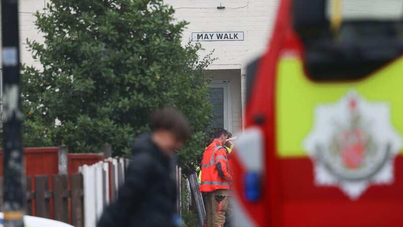 Emergency services at the scene in May Walk, Partington, today (Image: Manchester Evening News)