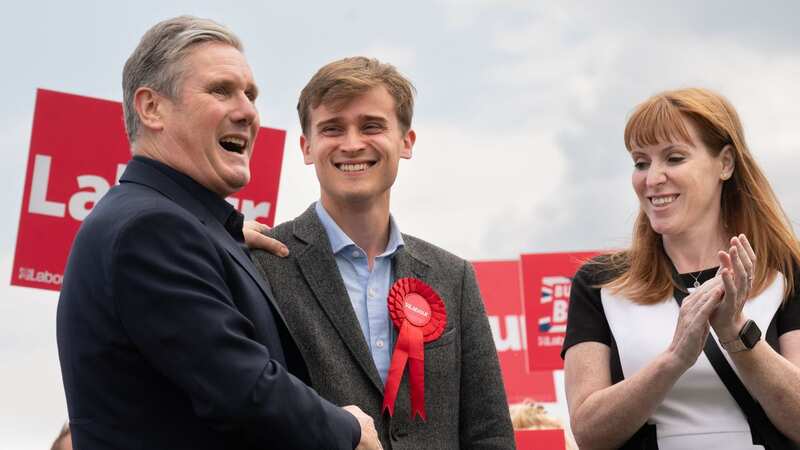 Newly elected Labour MP Keir Mather (centre) with Labour leader Sir Keir Starmer at Selby football club, North Yorkshire (Image: PA)