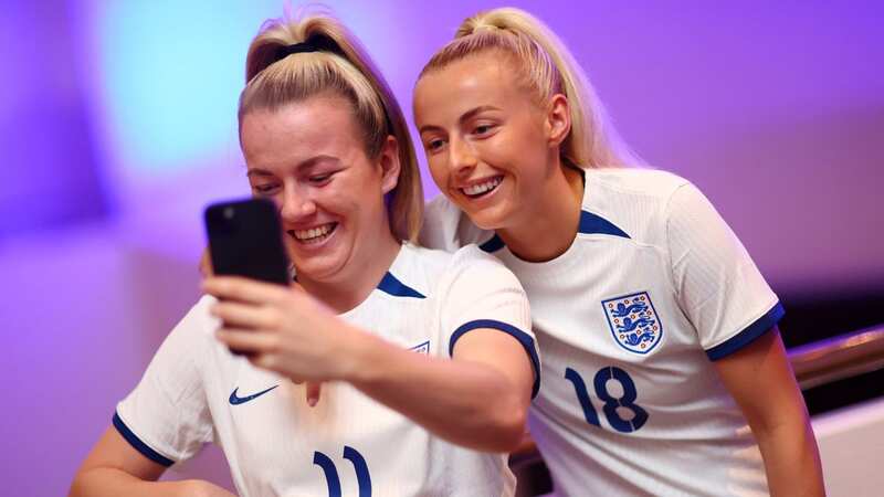 Lauren Hemp of England battles for possession with Sherly Jeudy of Haiti