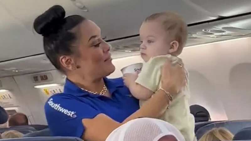 A Southwest Airlines flight attendant gained widespread praise after her heartwarming gesture towards a crying baby on flight 2890 was captured in a viral TikTok video. (Image: jessicawindsorr/TikTok)