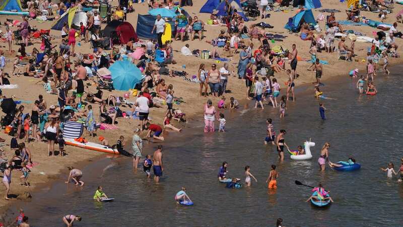 People on the beach at Cullercoats Bay in North Tyneside (Image: PA)