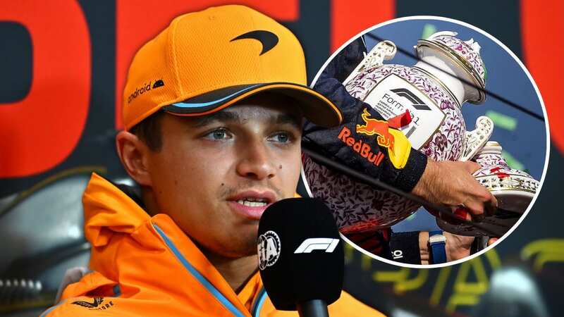 Verstappen saw the funny side after his trophy smashed (Image: AFP via Getty Images)