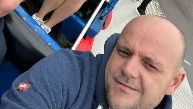 Craig Knight with his family on a ride at the amusement park, before the day took a painful turn (Image: Craig Knight)