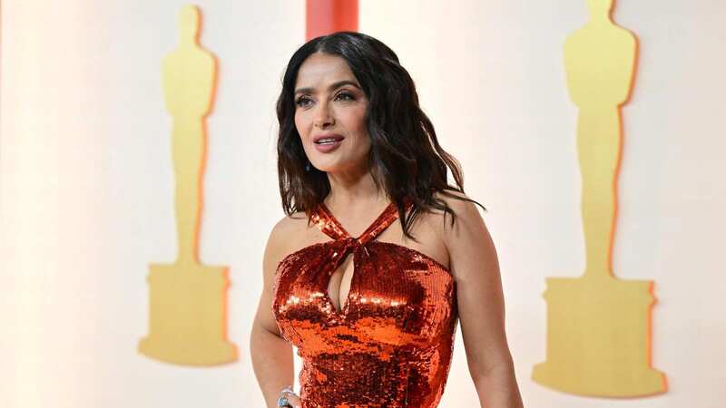 Salma Hayek shared her natural grey hairs with her 25 million Instagram followers (Image: AFP via Getty Images)