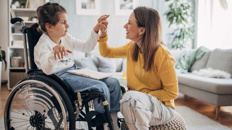 Parents who have children with health conditions or disabilities can claim Disability Living Allowance (DLA) to help with day to day costs (Image: Getty Images)