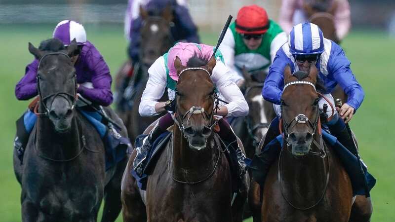Jim Crowley riding Hukum (right) wins the King George VI And Queen Elizabeth Qipco Stakes from Westover (Image: Getty)