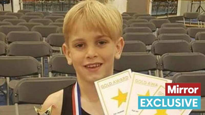 Gymnastics fan Archie Battersbee with awards