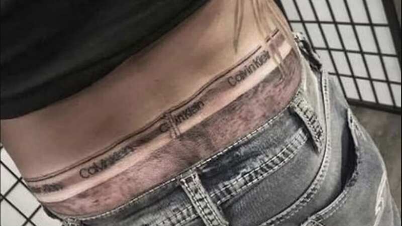 The man decided to get a pair of boxer shorts inked onto his lower back