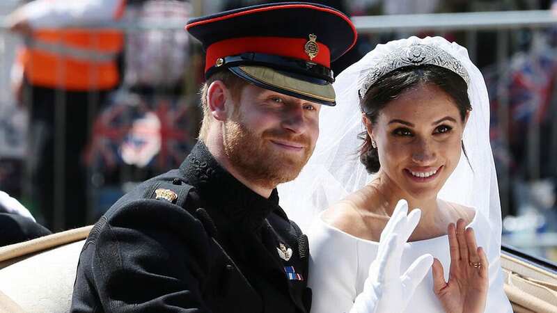 Prince Harry and Meghan Markle on their wedding day in 2018 (Image: Getty Images)