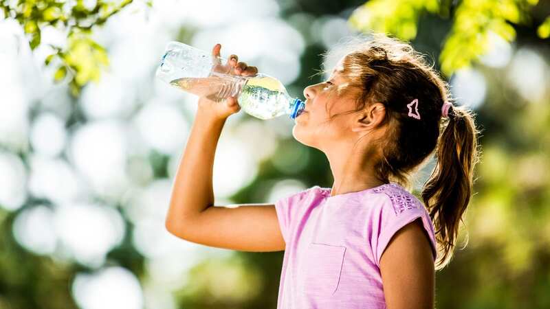 Nearly half of parents are on high alert when it comes to keeping little ones hydrated during the summer months (Image: Science Photo Library/Getty Images)