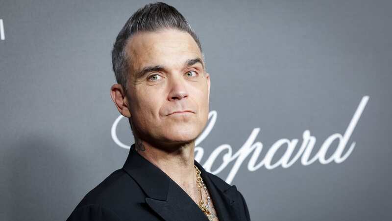 Robbie put on a cheeky display for fans (Image: Getty Images for Chopard)