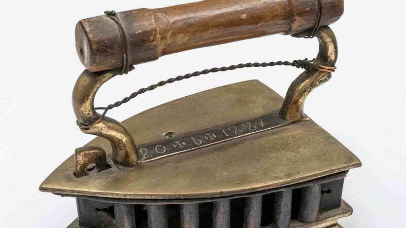 A vintage iron from the collection (Image: Mark Laban / Hansons / SWNS)