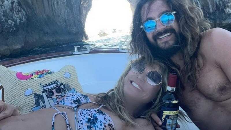 Heidi Klum packs on the PDA with husband in skimpy outfit on their anniversary
