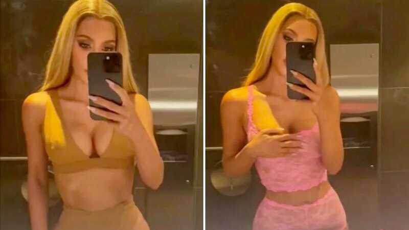Kim Kardashian promotes SKIMS end of summer sale in sexy see-through lace pink lingerie in new mirror selfie video (Image: Kim Kardashian/Instagram)