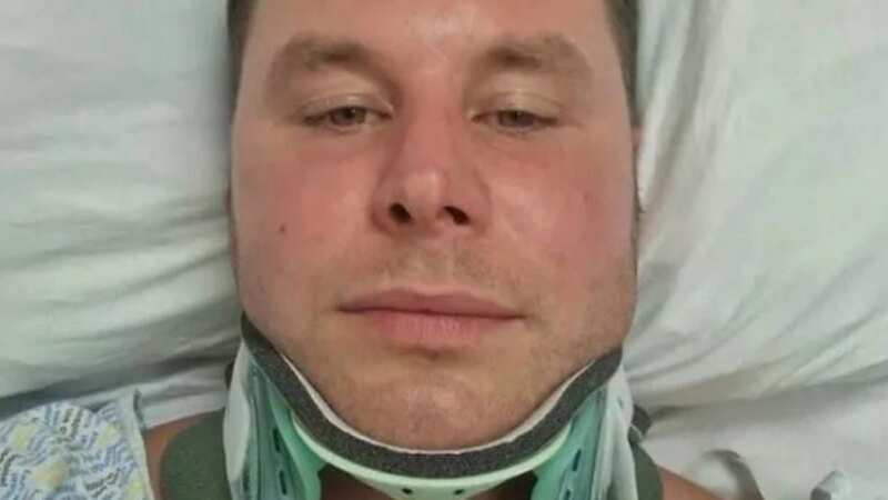 Adrian Scott, 33, has been left in a neck brace and unable to move his head (Image: UGC)
