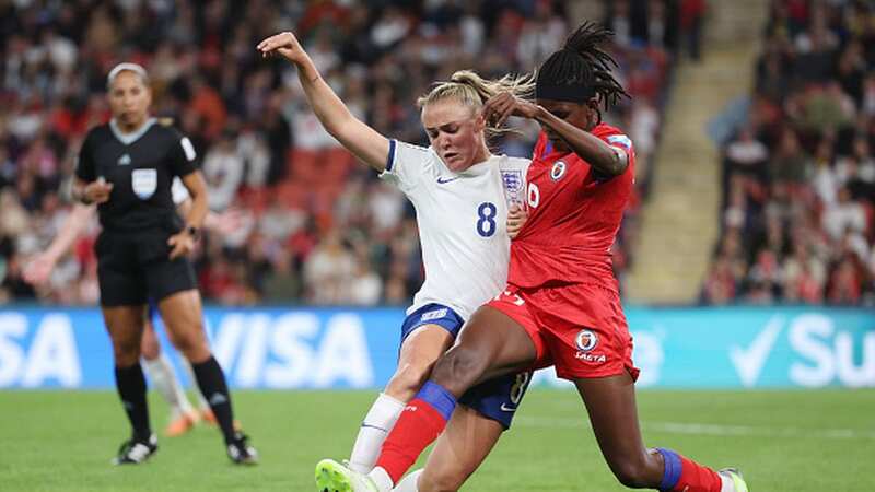 Georgia Stanway of England battles for possession with Dayana Pierre-Louis of Haiti in the Women
