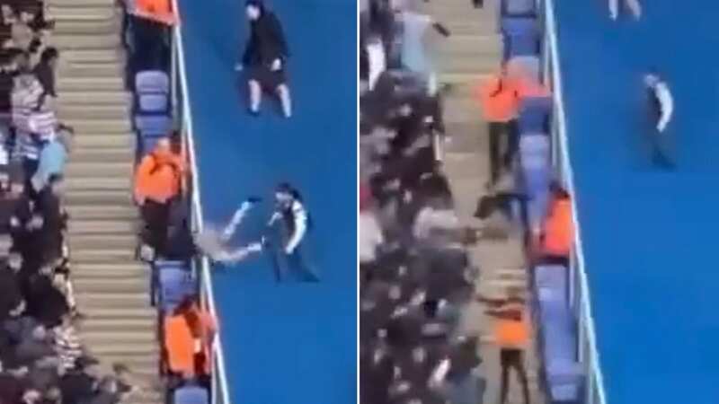 Peterborough yob falls over barrier attempting to spit at Reading fans