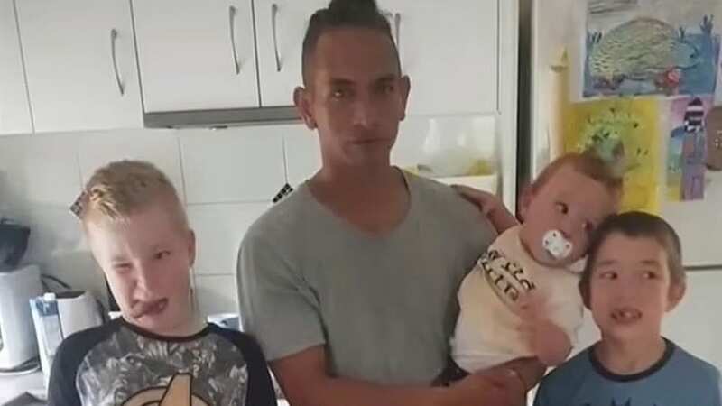 Wayne Godinet and his five sons, pictured, died in the house fire