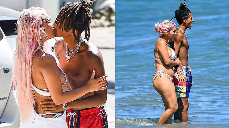 Rapper Jaden Smith was spotted locking lips with a stunning pink-haired mystery woman during a romantic beach outing (Image: Splash News)