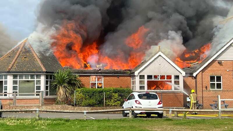 Massive fire billows from Harvester with multiple fire engines at scene