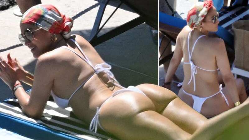 Jennifer Lopez continues to defy her age as she is posed out in the Italian sun showing off her toned figure and signature curves (Image: Backgrid)