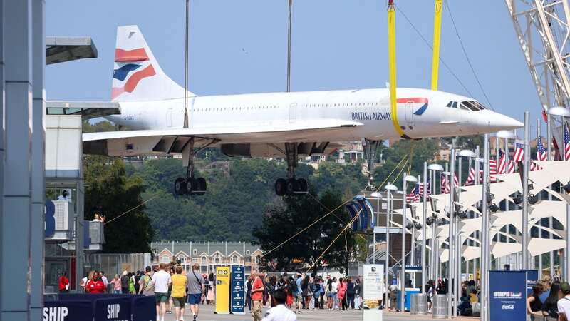 Tourists watched jet being lifted (Image: Guerin Charles/ABACA/REX/Shutterstock)