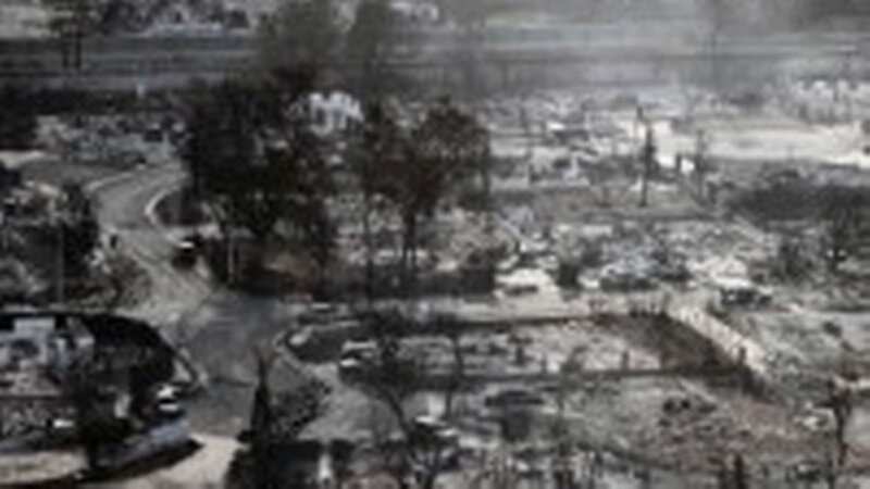 With a town turned to ashes, 53 have been declared dead so far with many more missing as communications are down