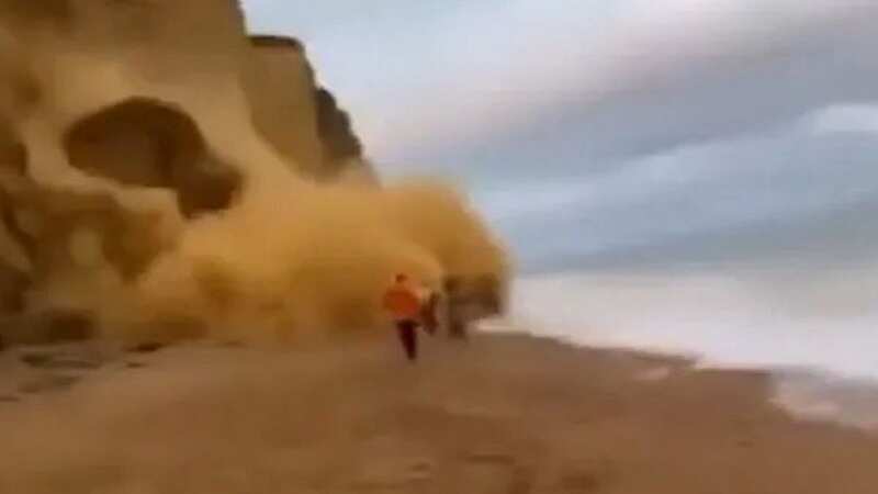 Beachgoers flee for lives as cliff collapses inches from where they’re standing
