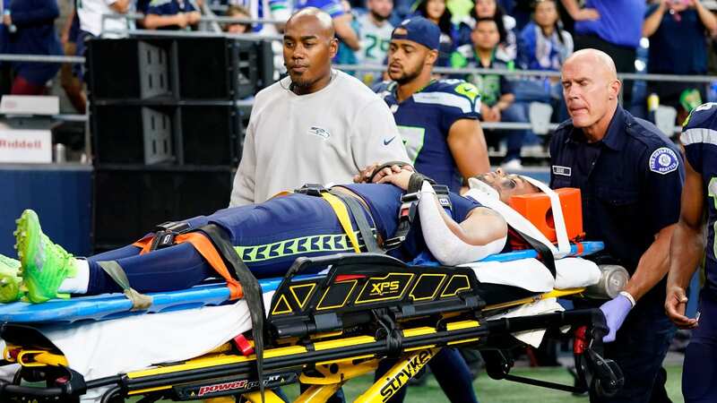 Cade Johnson was stretchered off and taken to the hospital for tests (Image: AP)