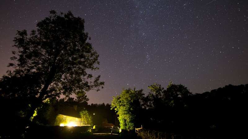 A meteor passes across the sky during the peak in activity of the annual Perseids meteor shower several years ago (Image: AFP/Getty Images)