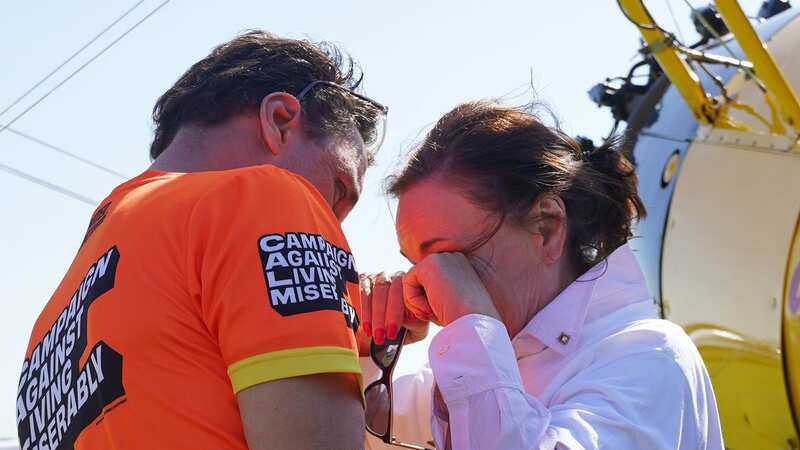 Shirley Ballas embraced by Daniel Taylor after completing her wing walk (Image: PA Wire)