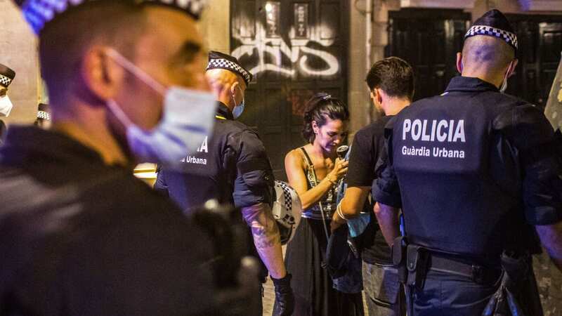 Cops seen evicting crowds in Catalonia (Image: SOPA Images/LightRocket via Getty Images)