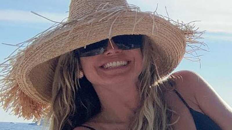 MAIN - Heidi Klum shows off toned booty in skimpy bikini for sizzling beach snaps