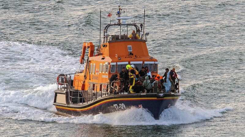 Migrants brought to Dover by a Royal National Lifeboat Institution (RNLI) lifeboat (Image: AFP via Getty Images)