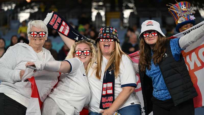 England fans roar for the team against Columbia at the Stadium Australia in Sydney (Image: Andy Stenning/Daily Mirror)