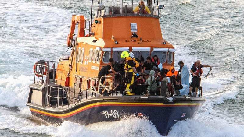 Migrants picked up at sea while attempting to cross the English Channel yesterday (Image: AFP via Getty Images)
